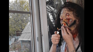 zombie makeup, smoking a cigarette