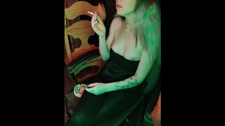 mistress smokes a cigarette