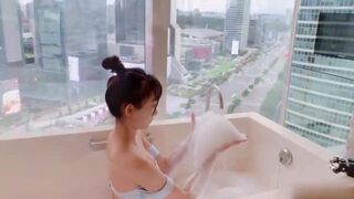 Gorgeous bitch taking bubble bath