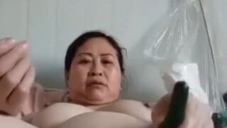 older chubby asian with veggie